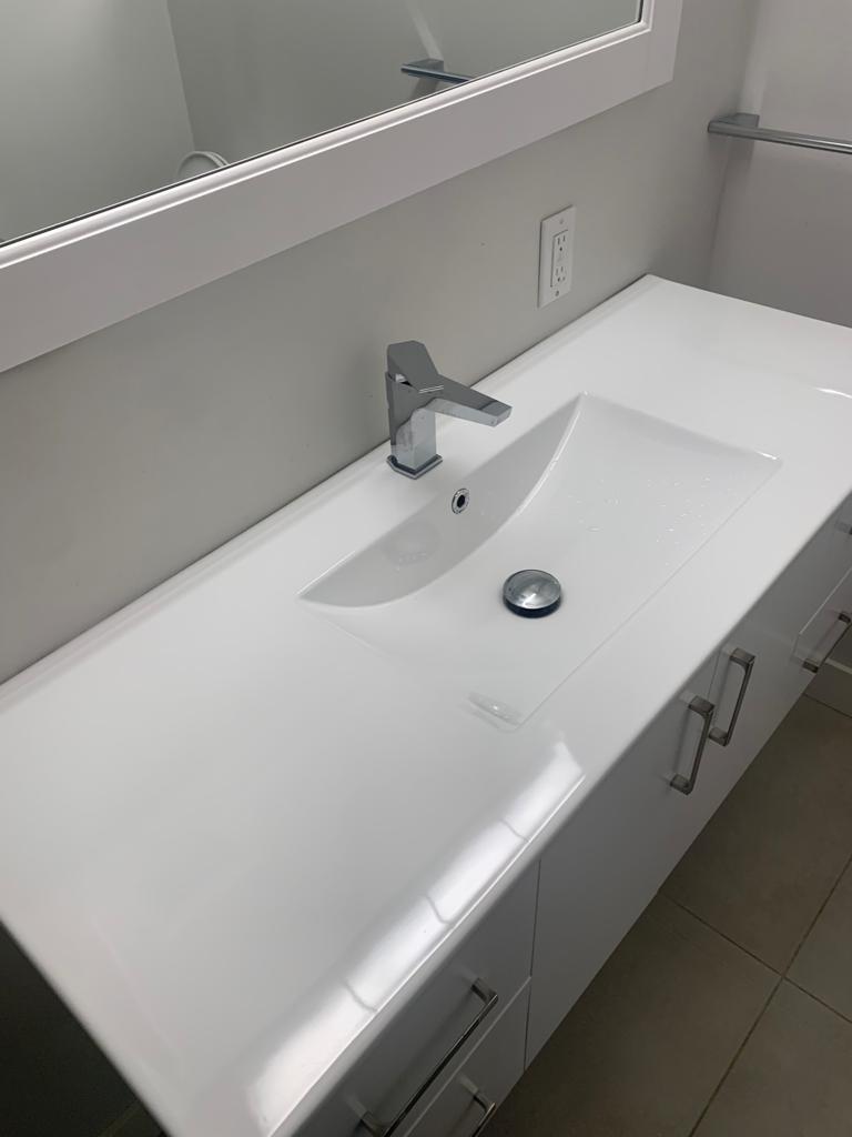 a clean white marble countertop cleaned by top cleaners united